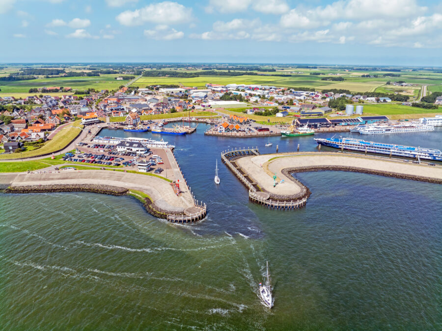 Aerial view of Texel Ferry Terminal near the historic town of Oudeschild on Texel island, Netherlands.
