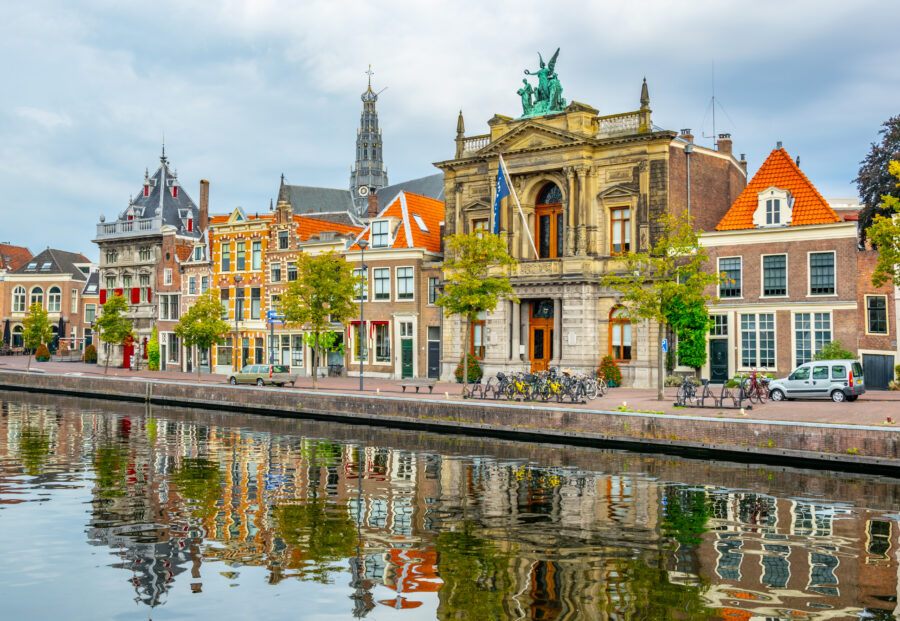 Teylers Museum located beside a channel in Haarlem, Netherlands, showcasing historic art and scientific collections.