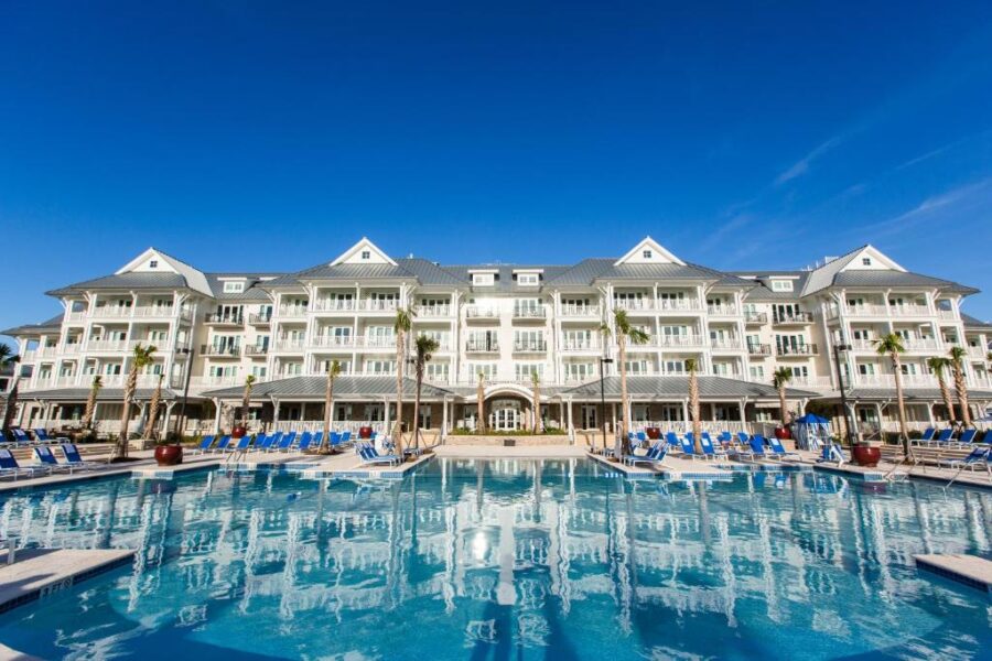 The Beach Club at Charleston Harbor Resort and Marina, showcasing a scenic view of the beach and resort amenities.
