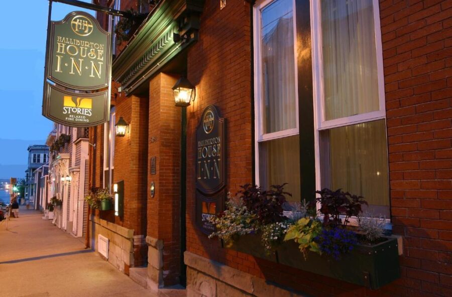 The Halliburton hotel inn at the corner of a street in Halifax, Canada, showcasing its charming exterior.