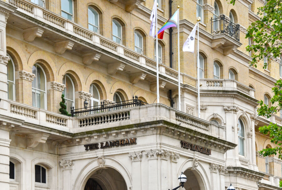 Front view of The Langham, a luxury hotel in central London, showcasing its elegant architecture and welcoming entrance