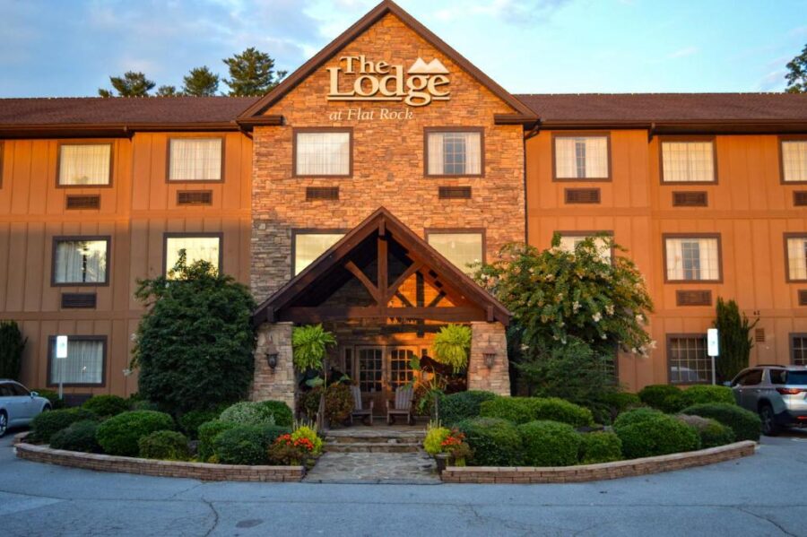 The Lodge at Flat Rock, a welcoming inn and suites, surrounded by nature and offering comfortable accommodations.