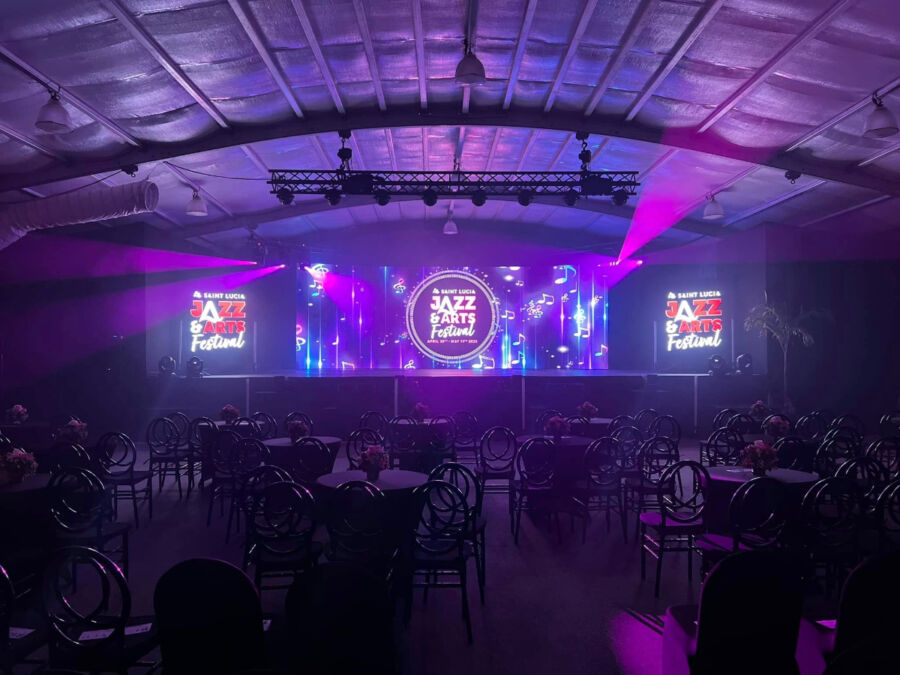 Venue of the Saint Lucia Jazz & Arts Festival illuminated with colorful lights, showcasing a vibrant atmosphere