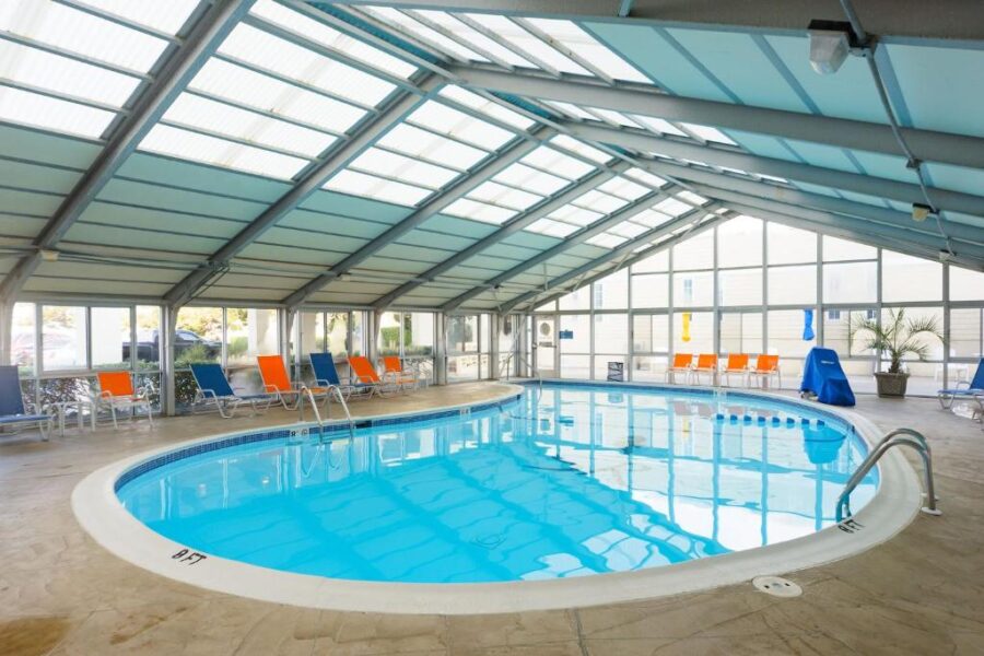 Indoor pool at the Sea Ranch Resort in Kill Devil Hills, North Carolina, featuring a bright, inviting atmosphere for guests.