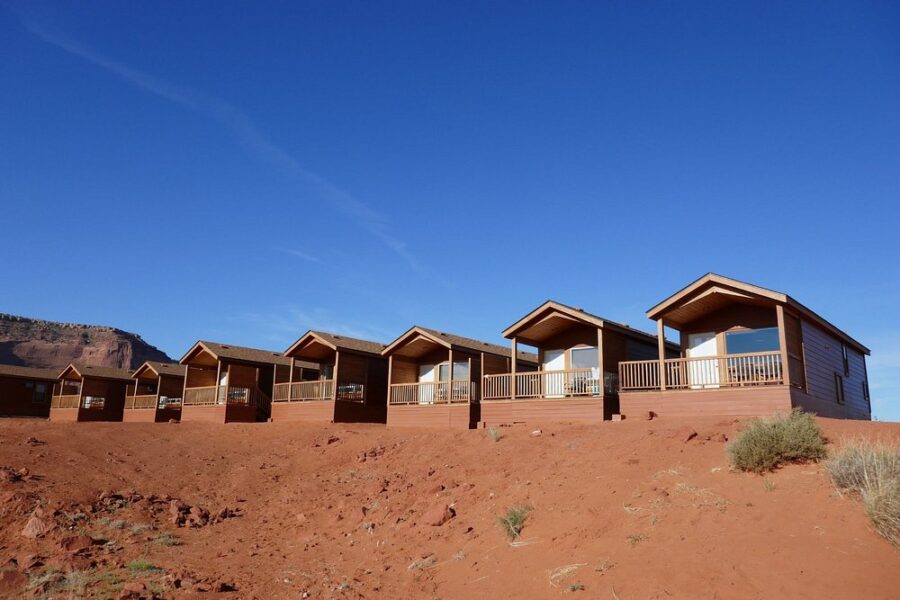 Hillside cabins at The View Campground in Monument Valley, nestled in the arid desert terrain.