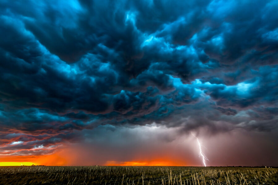 Thunderstorm with striking lightning over a vast field in Roswell, New Mexico