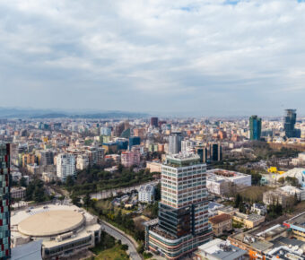 Aerial view of Tirana, Albania, highlighting its vibrant urban landscape and diverse architecture