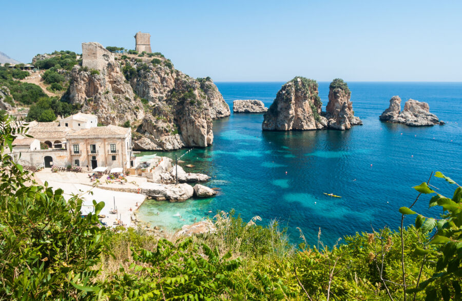 Scenic view of Tonnara di Scopello in Sicily, showcasing its picturesque skyline and coastal landscape