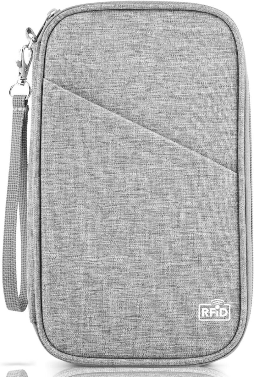 Gray TOPBAG Travel Organizer case with a zipper and strap, designed for convenient travel storage and organization.