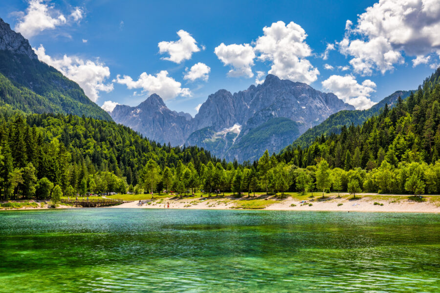 Tranquil valley within Triglav National Park, framed by the stunning Julian Alps in Slovenia