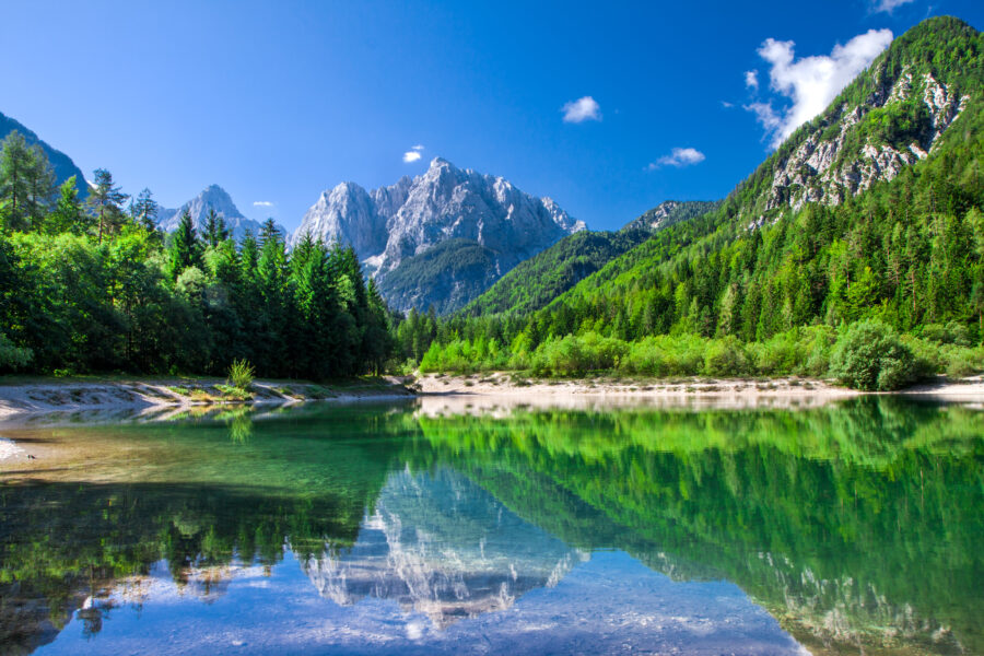 Scenic valley in Triglav National Park, showcasing the stunning Julian Alps in Slovenia
