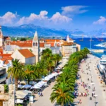 Scenic view of Trogir, a historic town in the Dalmatia region of Croatia, showcasing its medieval architecture and coastal charm.