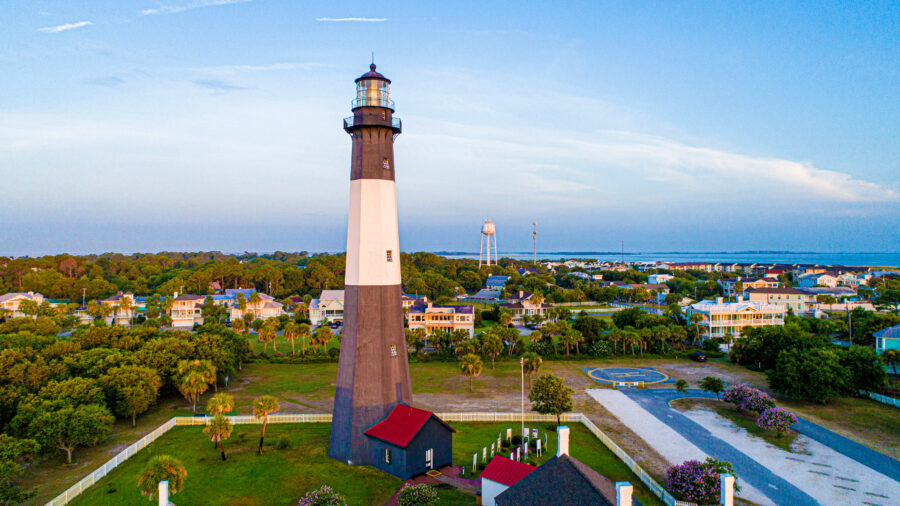 Panoramic view of Tybee Island, Georgia, showcasing sandy beaches, ocean waves, and a clear blue sky