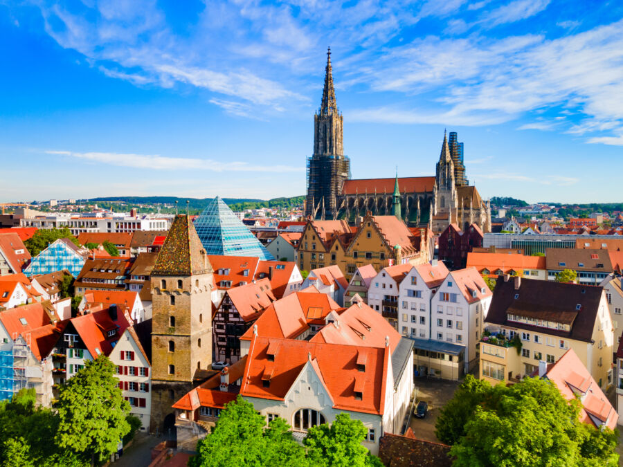 Panoramic aerial view of Ulm Minster Church, highlighting its impressive architecture and the city of Ulm, Germany.