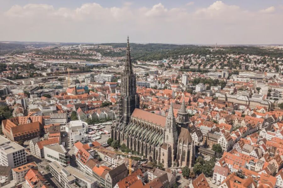Aerial view of Bavaria, Germany, showcasing the cityscape with Ulm Minster prominently in the foreground.