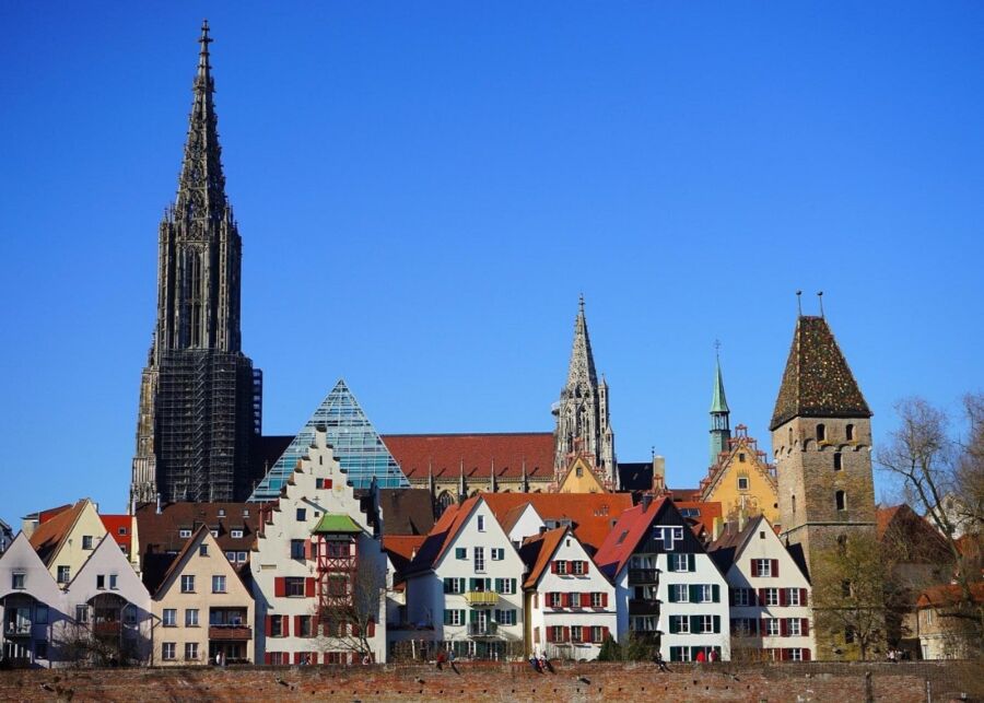 Panoramic view of Bamberg, Germany, showcasing its historic architecture and scenic river landscape.