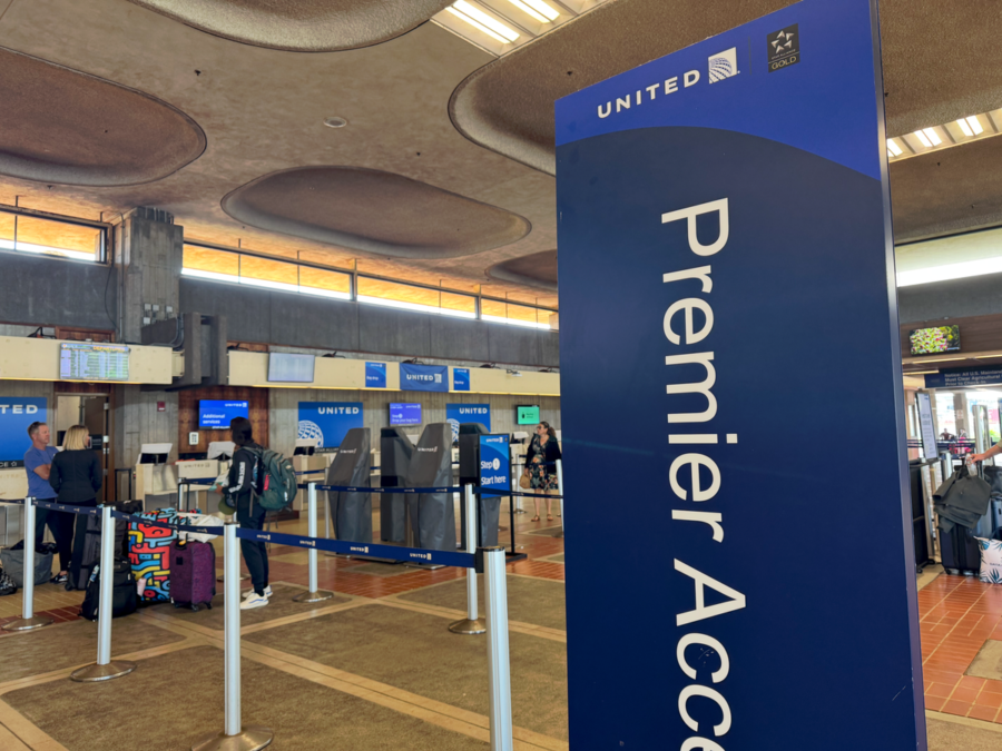 United Airlines Premier Access check-in at vibrant Kahului Airport terminal.
