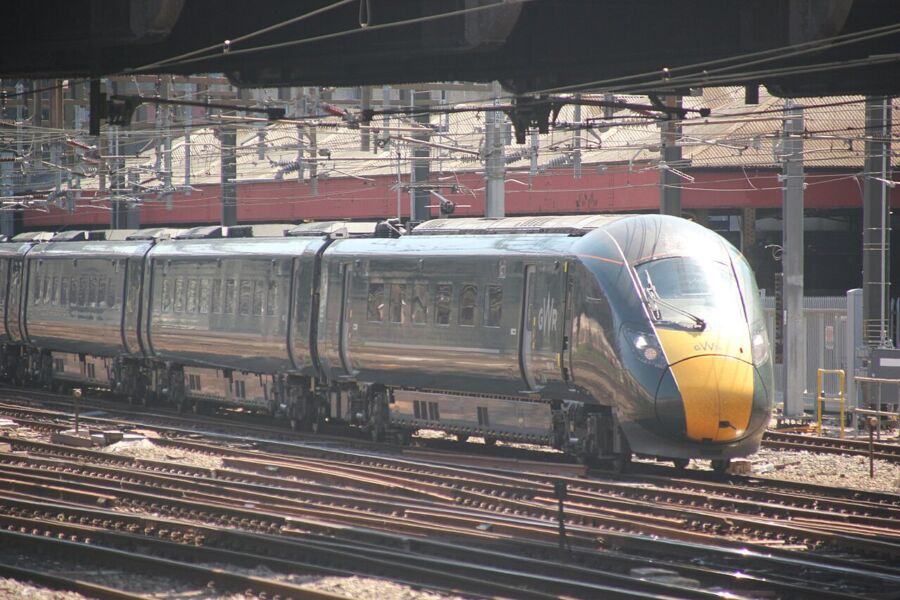 Train on the tracks, showcasing the United Kingdom's rail transport system.