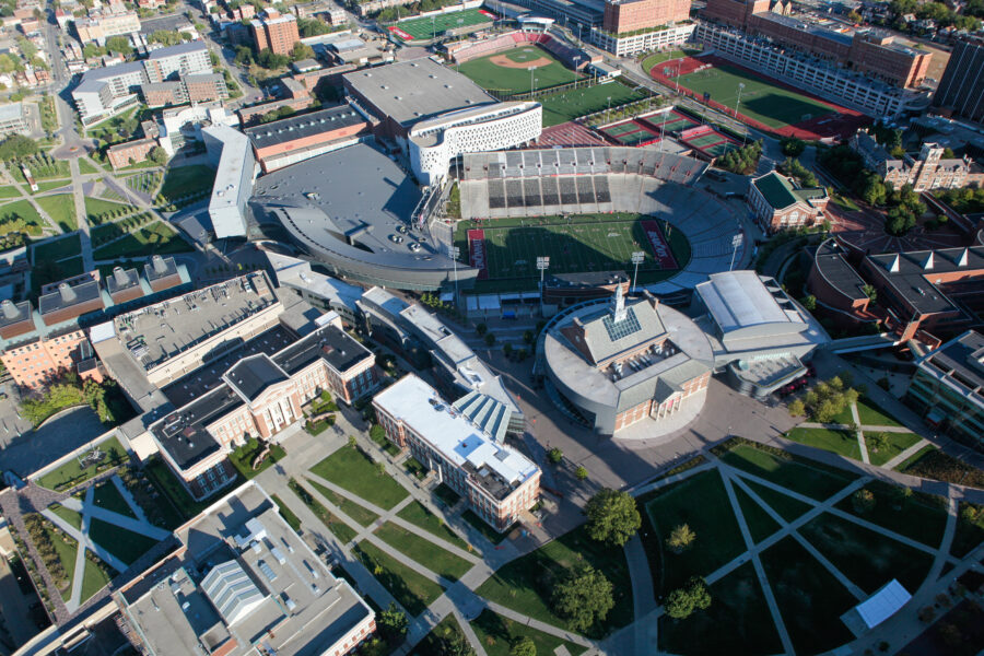 Aerial perspective of the University of Cincinnati, highlighting the stadium and its vibrant campus layout