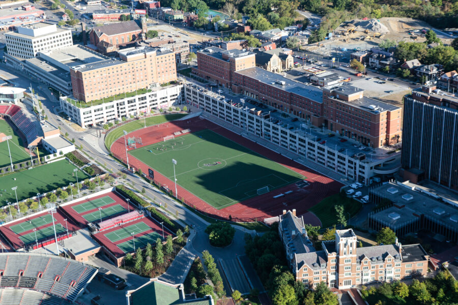 Aerial view of the University of Cincinnati campus, showcasing the stadium and surrounding buildings