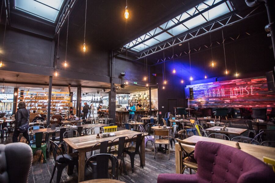 Interior of Urban House Bratislava featuring modern table and chairs in a stylish setting