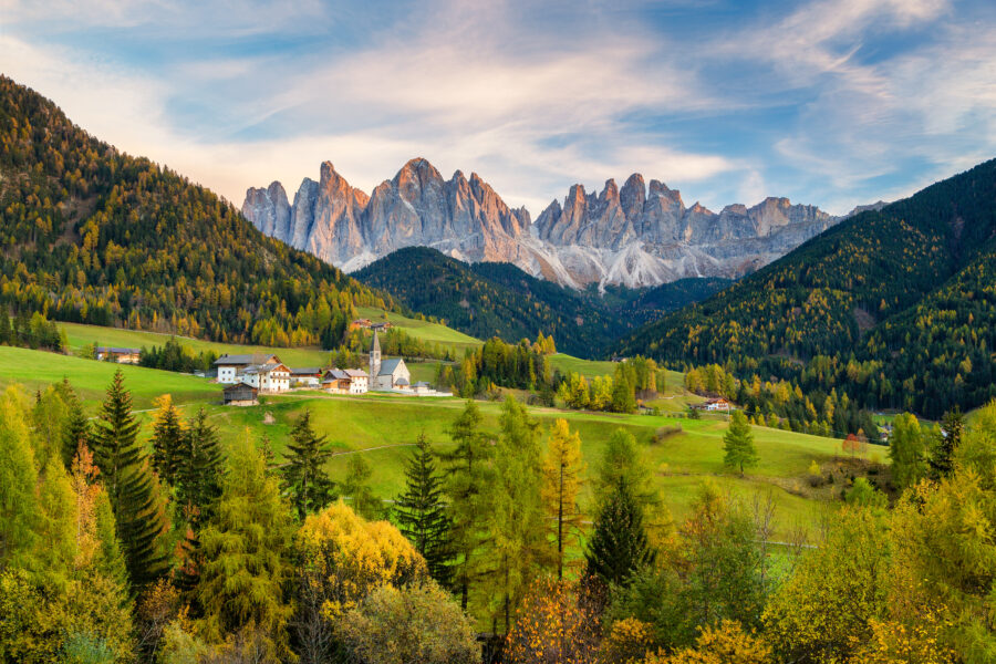 Sunset over Val di Funes in the Dolomites, showcasing the stunning landscape of South Tyrol, Italy