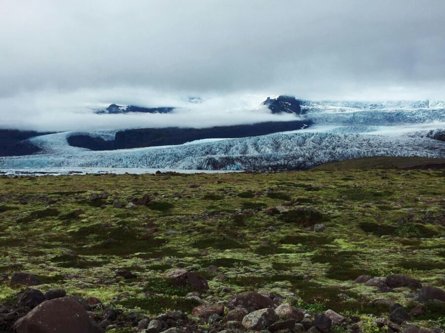 Panoramic view of the Vatnajökull glacier in Iceland, highlighting its vast ice expanse and surrounding natural beauty.