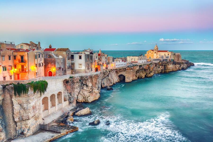 Scenic view of Vieste, a picturesque coastal town perched on rocky cliffs in Puglia, Italy.