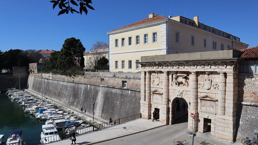 Substantial structure with a large entrance gate and a boat dock, found in Voštarnica, Zadar, Croatia.