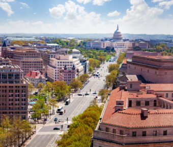 Aerial view of Pennsylvania Avenue and the U.S. Capitol Building, showcasing the National Mall in Washington, D.C.
