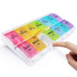 Two-row weekly AM/PM pill organizer, 14 compartments with colored lids for medication.
