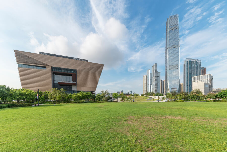 View of the West Kowloon Cultural District in Hong Kong, showcasing modern architecture and vibrant urban scenery