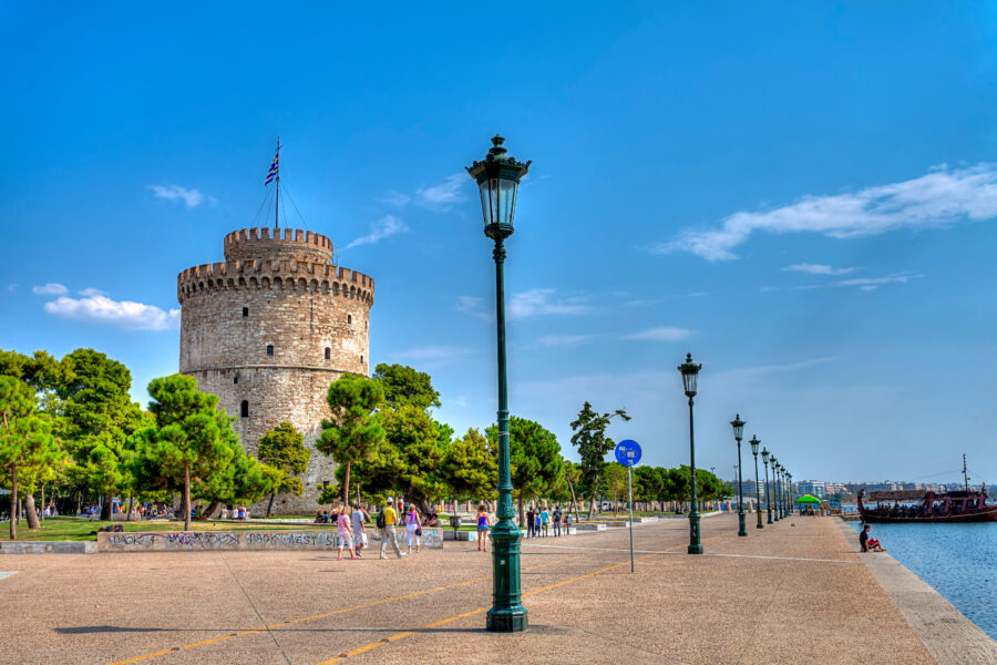 The White Tower stands prominently in Thessaloniki, Greece, showcasing its historic architecture against a clear sky