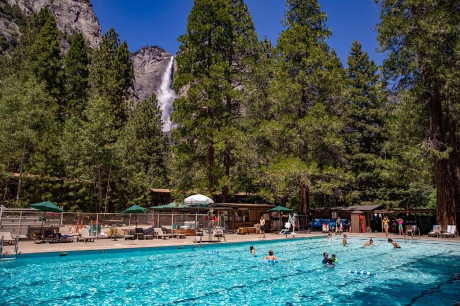 Yosemite Valley Lodge in Yosemite National Park, California, showcasing pool and stunning natural scenery.