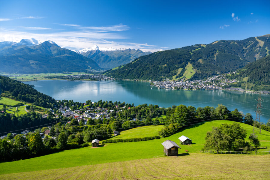 Scenic overlook of Zell am See, featuring the snow-covered Hohe Tauern mountains, highlighting Austria's natural beauty