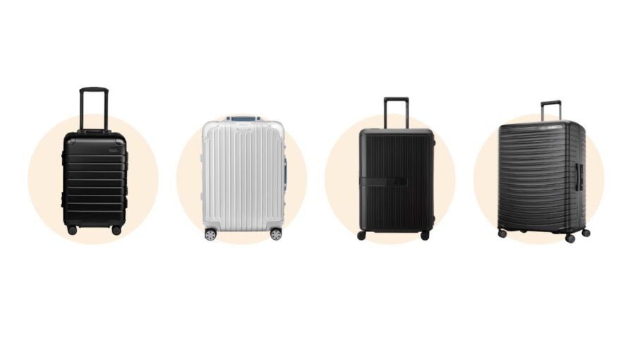 Display of four zipperless wheeled luggage pieces, highlighting different styles and sizes for travelers.